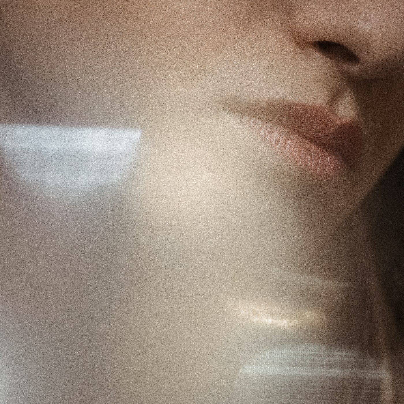 Even, luminous skin on a beauty model in studio light