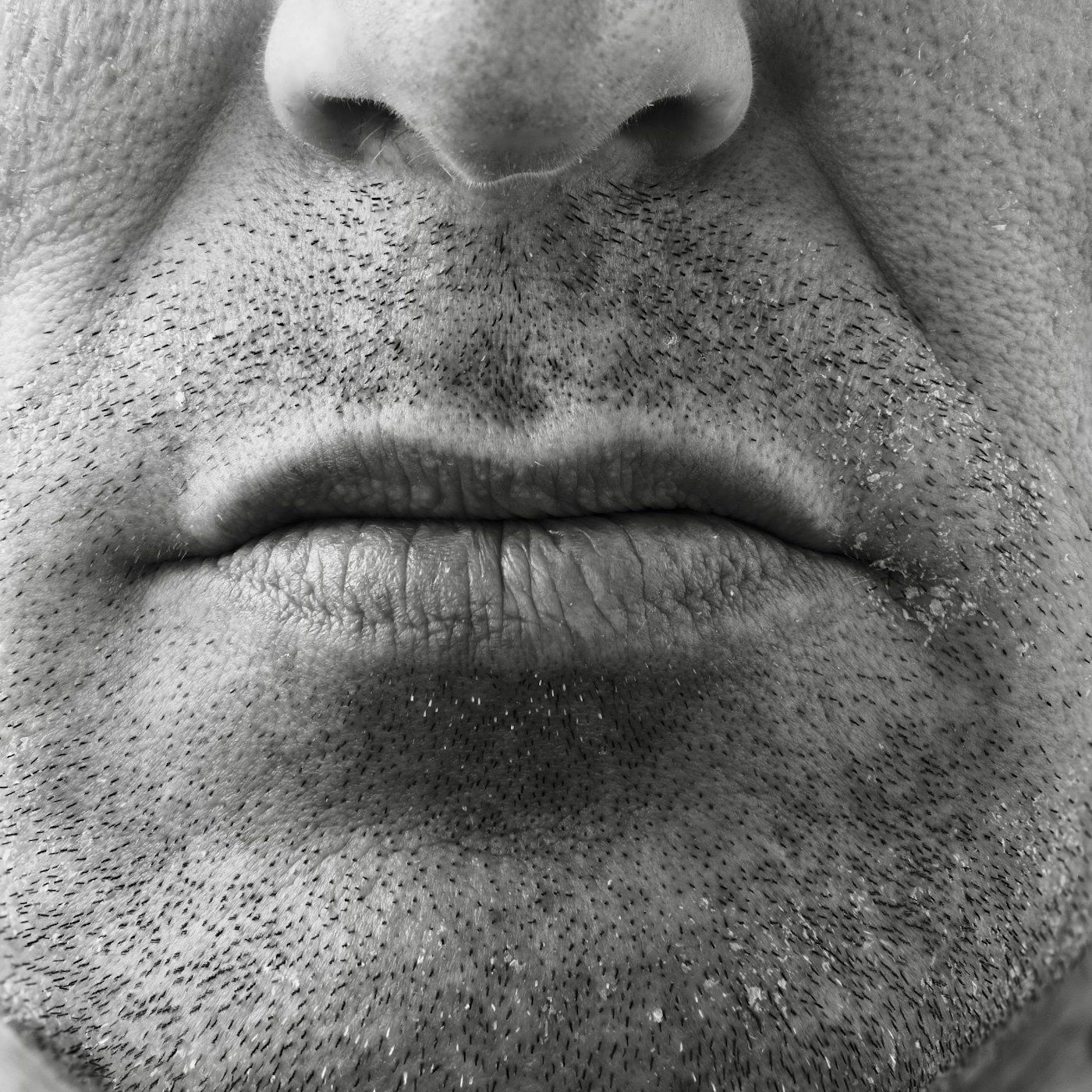Clear, even skin on a model in warm studio light