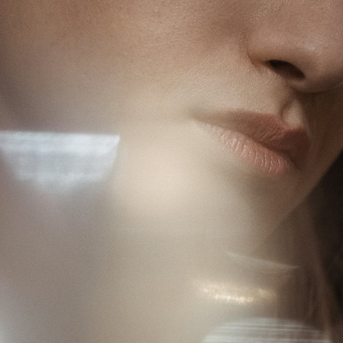 Defined jawline and firm skin along the neck