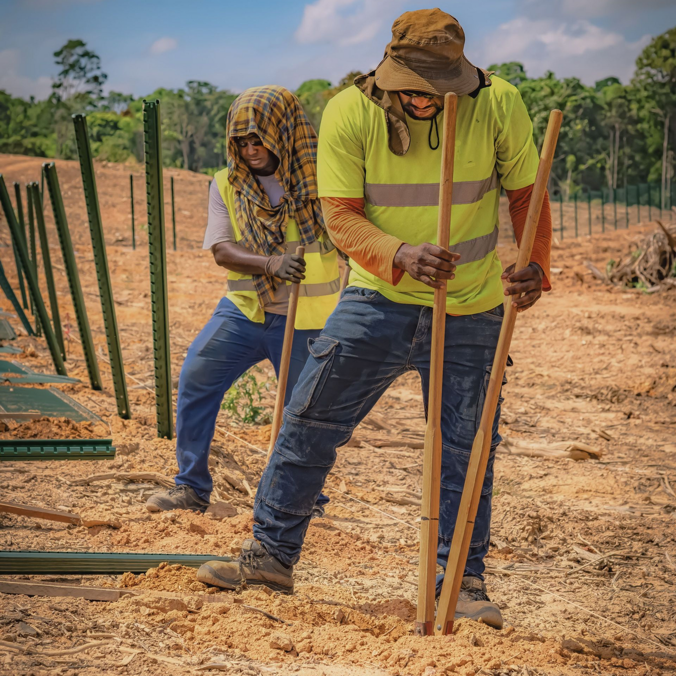 Skilled contractor installing a wood fence for a home by Kent Fence Installation Expert, WA fence installation comapany