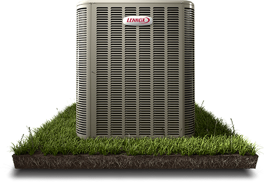 Lennox air conditioner unit on a grassy patch with exposed soil base