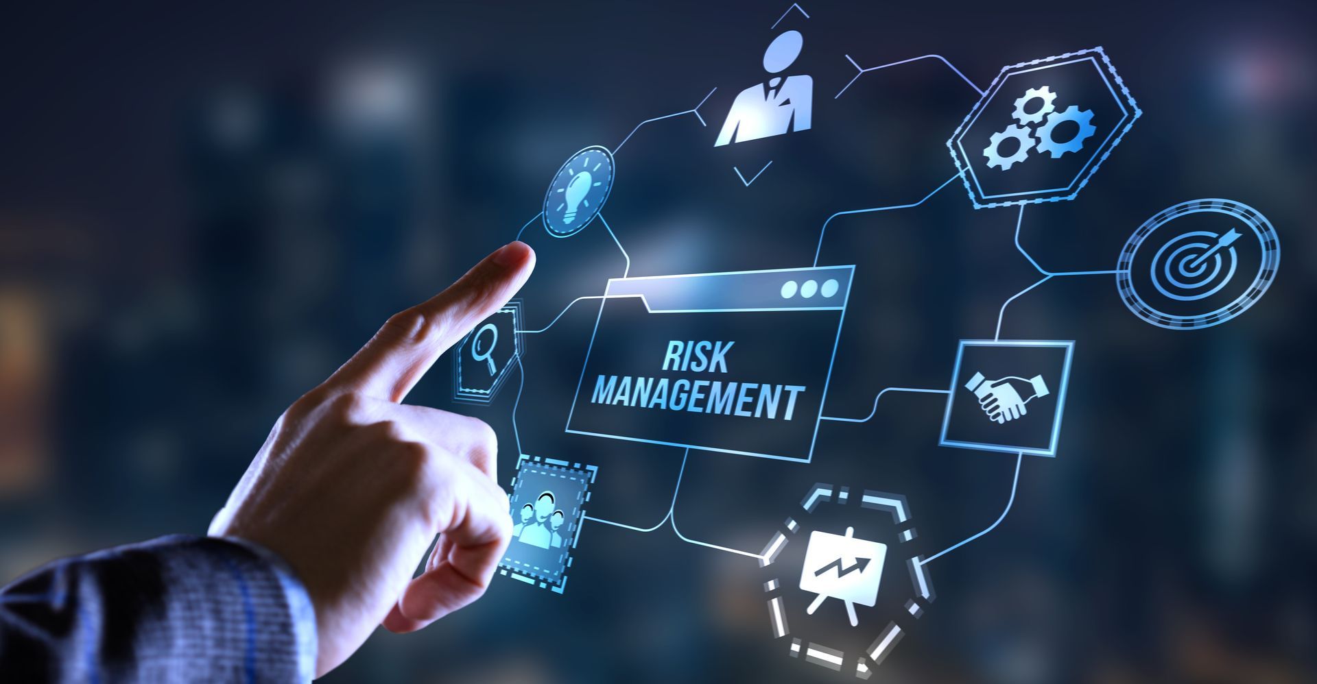 A person is pointing at a screen that says risk management.