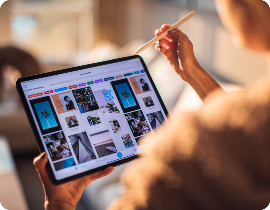 website templates displayed on a tablet as woman browses