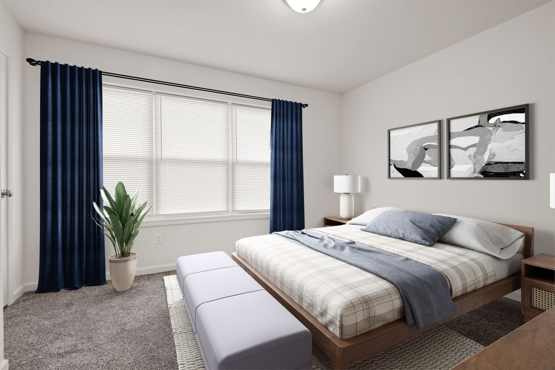 A bedroom with a large bed and blue curtains