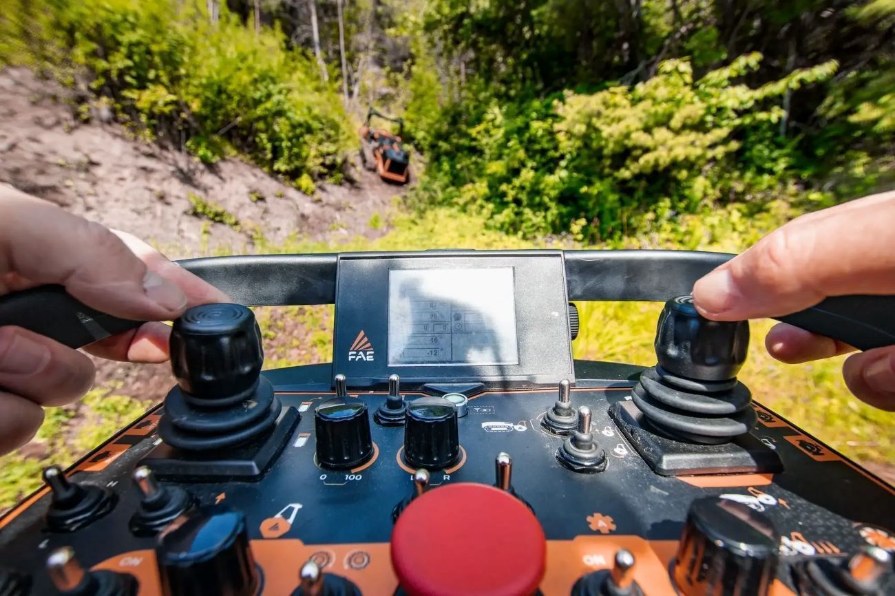 A Person is Using a Remote Control to Control a Machine — NQ Steep Terrain Mulching and Clearing in The Leap, QLD