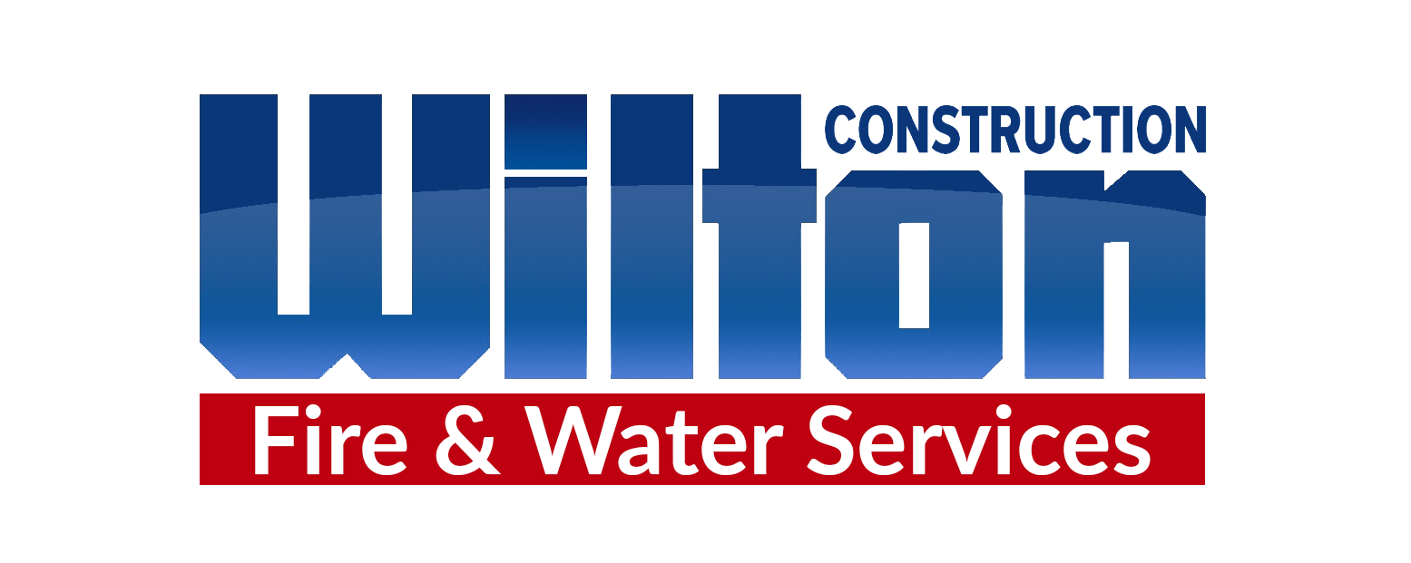 The logo for wilton construction fire and water services