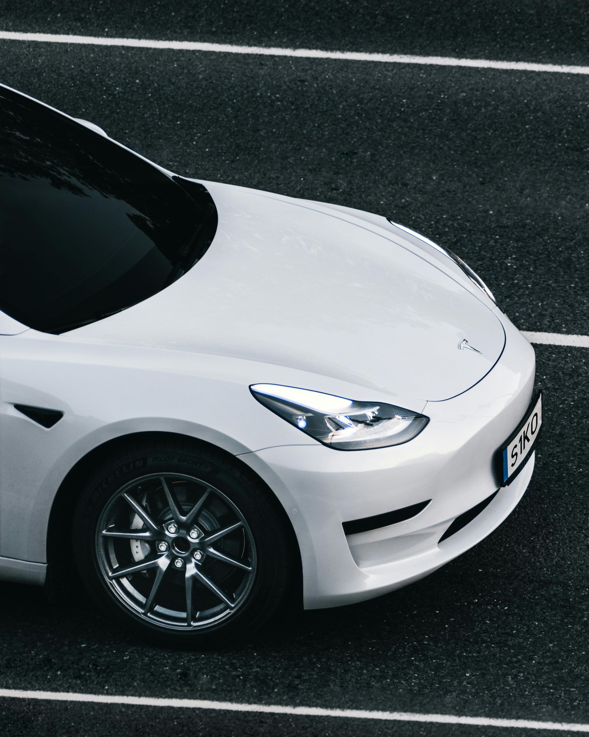 white Tesla vehicle