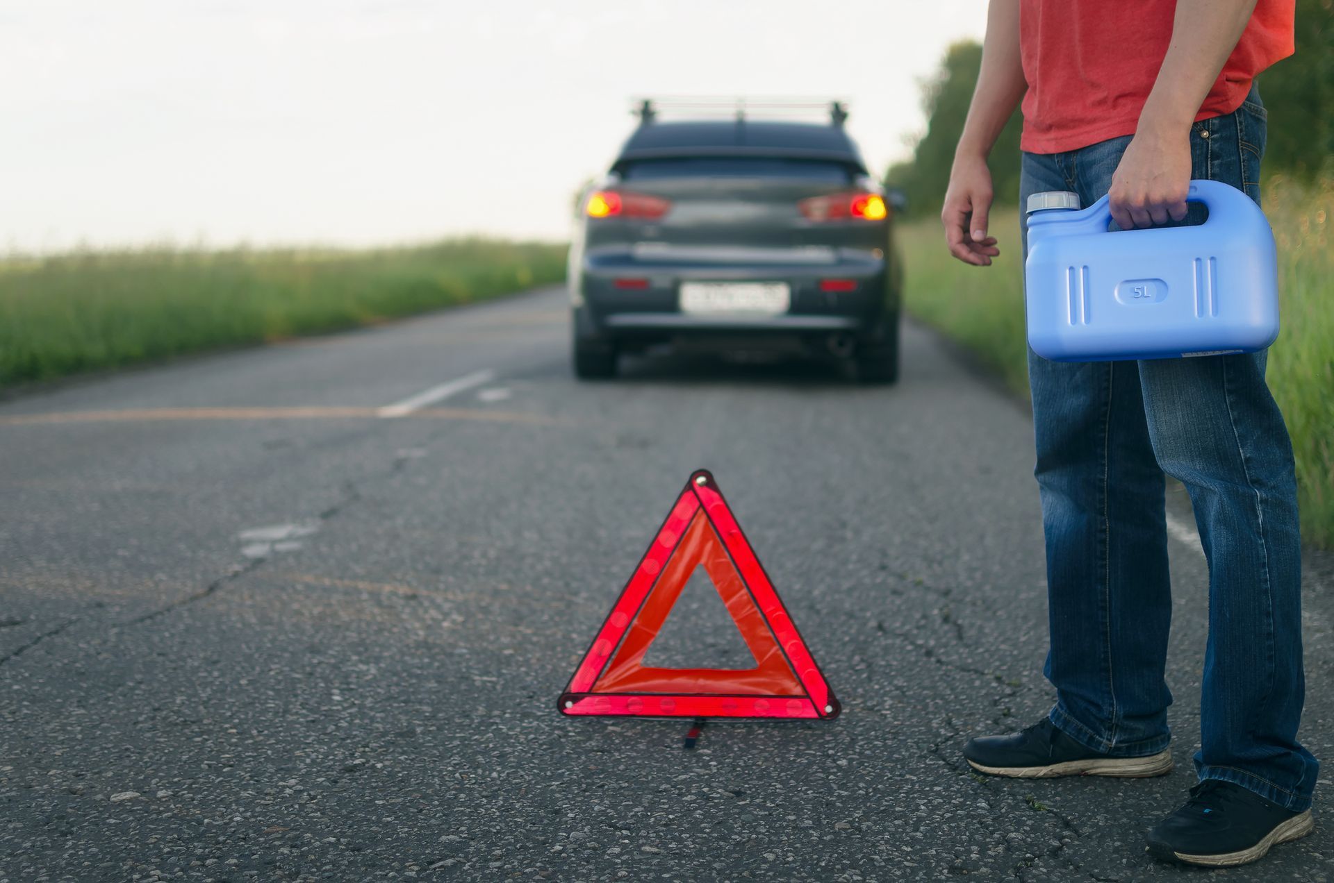 A Man Waiting for the Emergency Fuel – Canton, OH – Mike Spencer Towing A Man Waiting for the Emergency Fuel – Canton, OH – Mike Spencer Towing