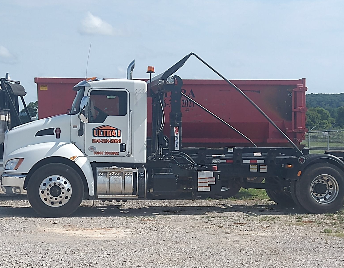 Green Dump Truck — Ultra Dumpsters and Waste Solutions — Tuscumbia, AL