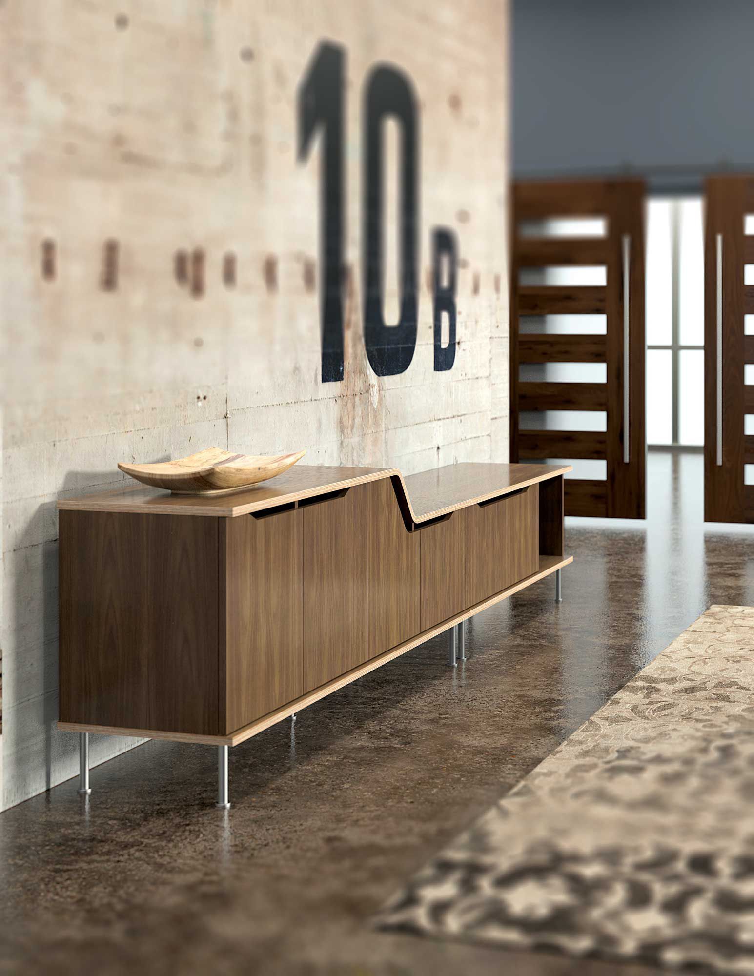 Brown wooden console with a bowl on top against a concrete wall with black lettering.