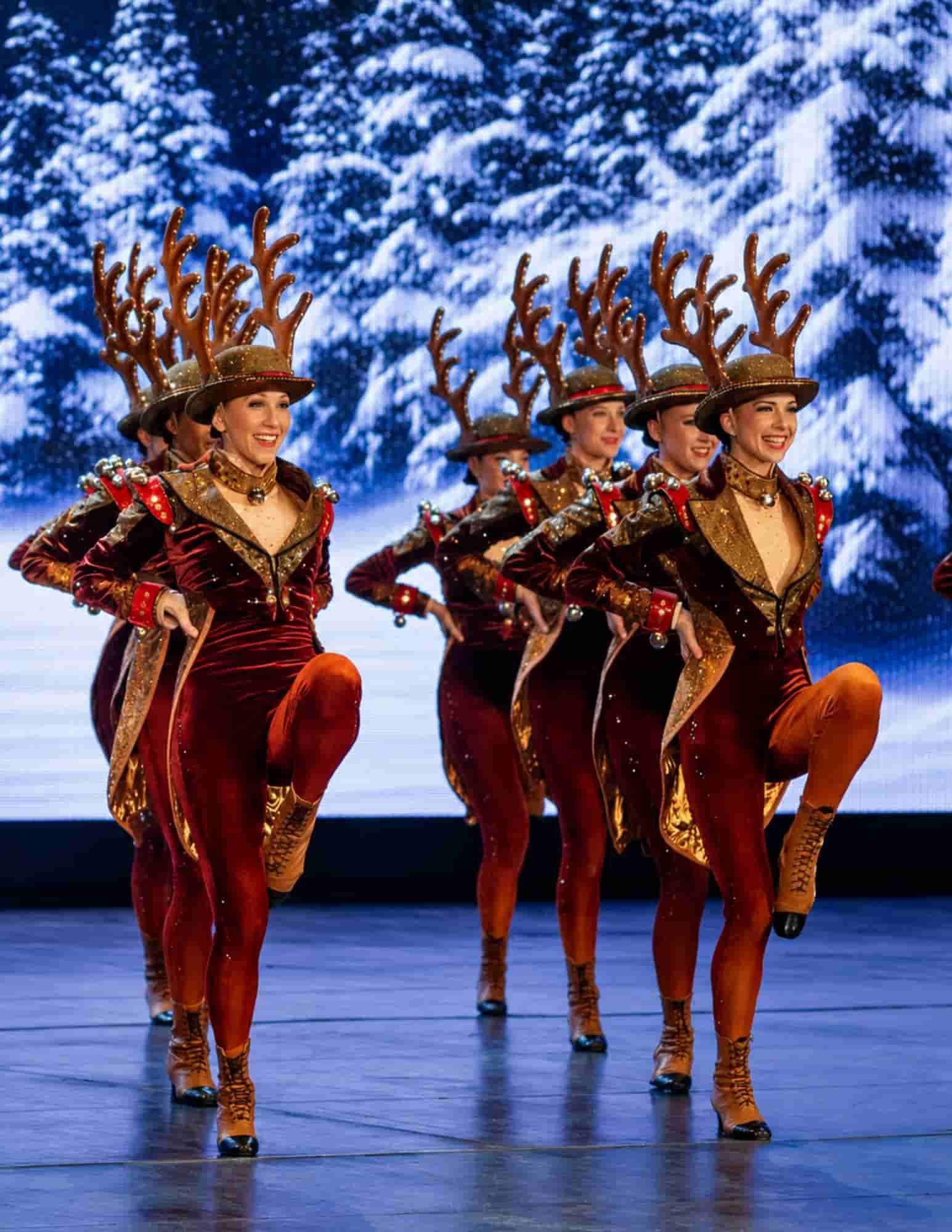 Holiday dancers performing at a Christmas show in Québec City, featured on CosmoVista Tours' Christmas at the Castle tour.