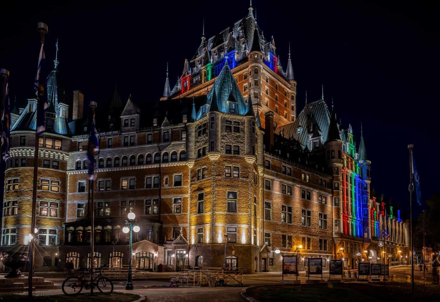 Fairmont Le Château Frontenac illuminated at night above Old Québec during the festive Christmas sea
