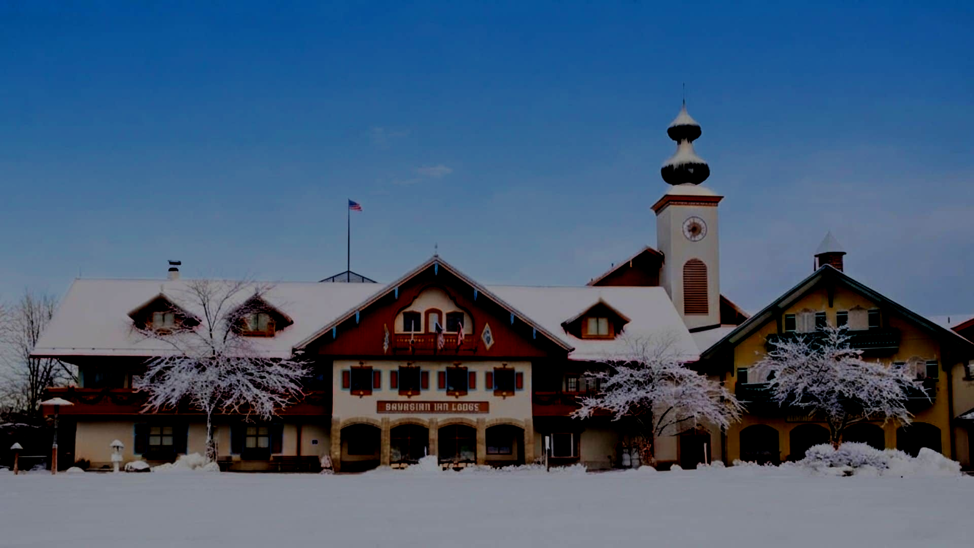 Snow-covered Bavarian Inn Lodge in Frankenmuth, Michigan, decorated for a festive Christmas winter g