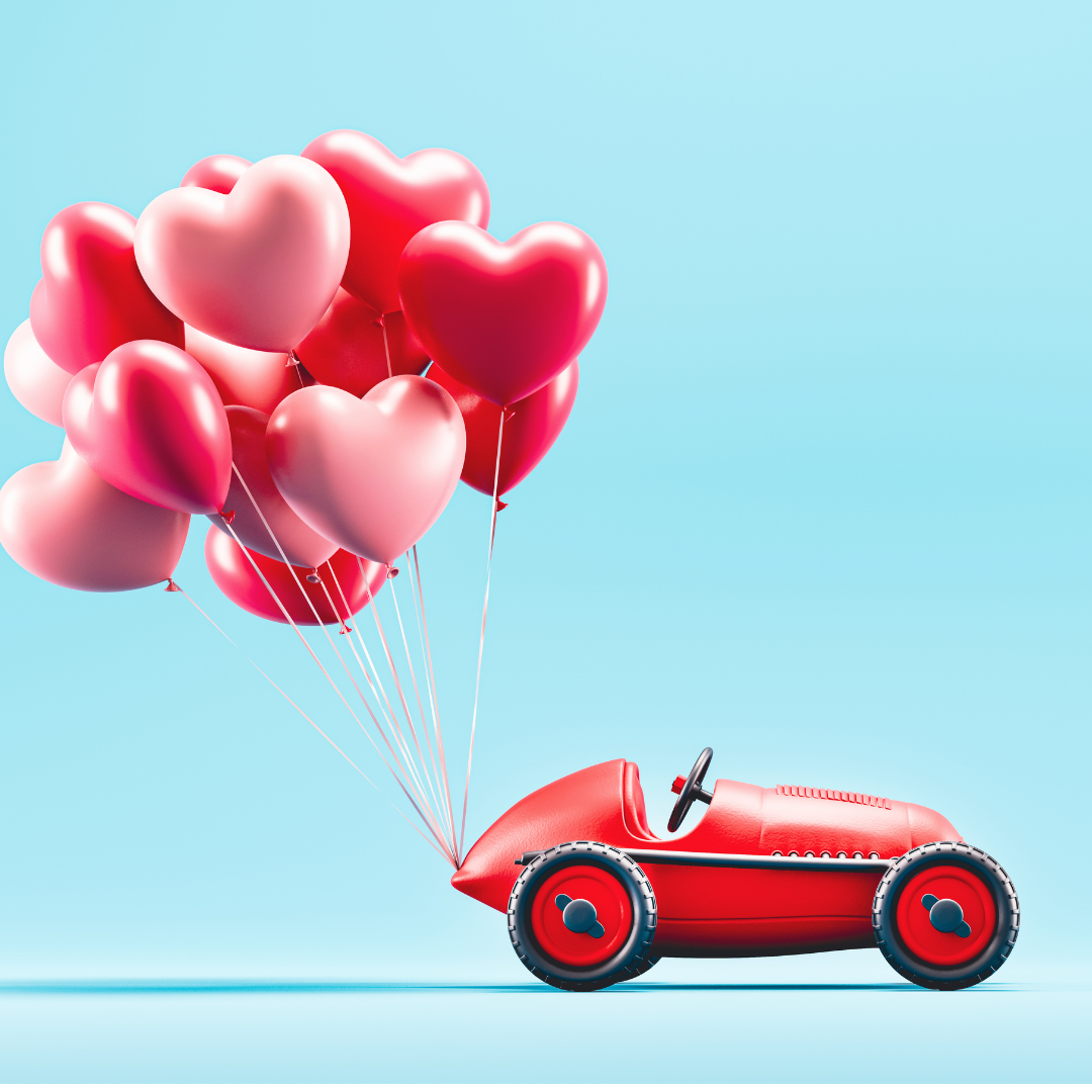 Car with heart balloons behind | Larsen Automotive Inc