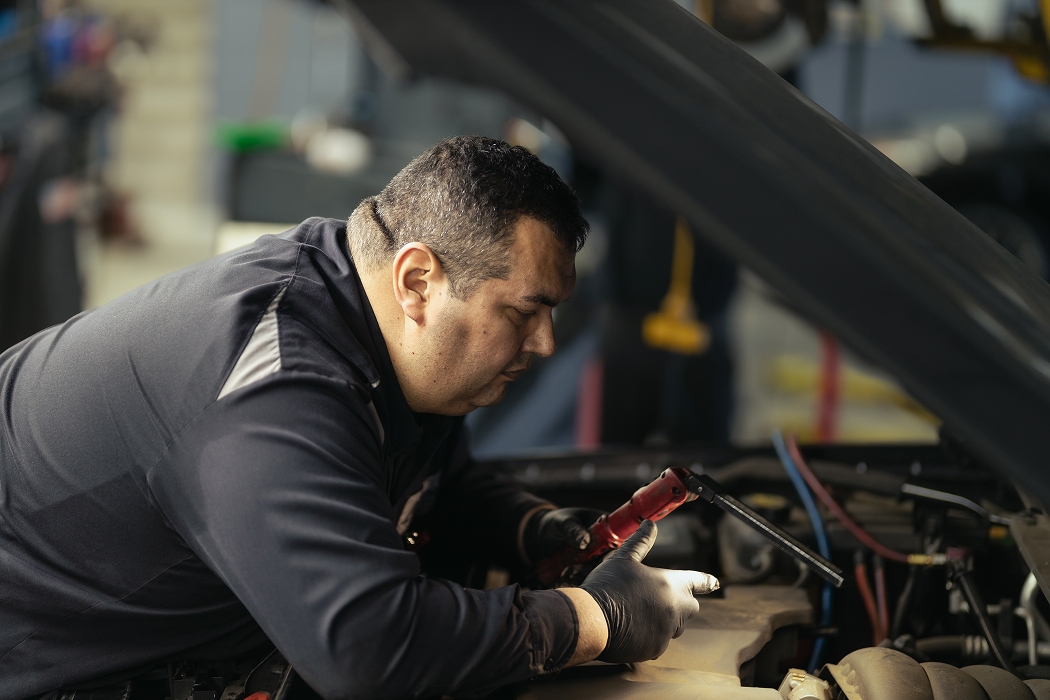 Technician working on a car | Larsen Automotive
