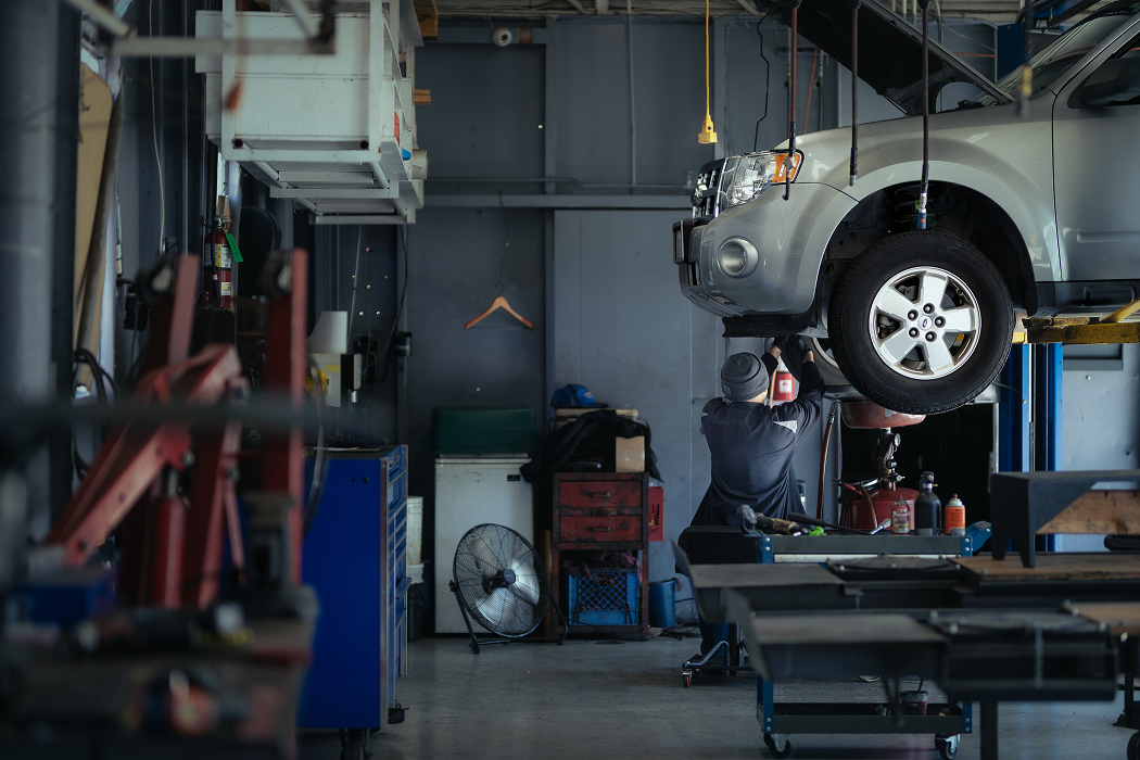 Technician working on a car | Larsen Automotive
