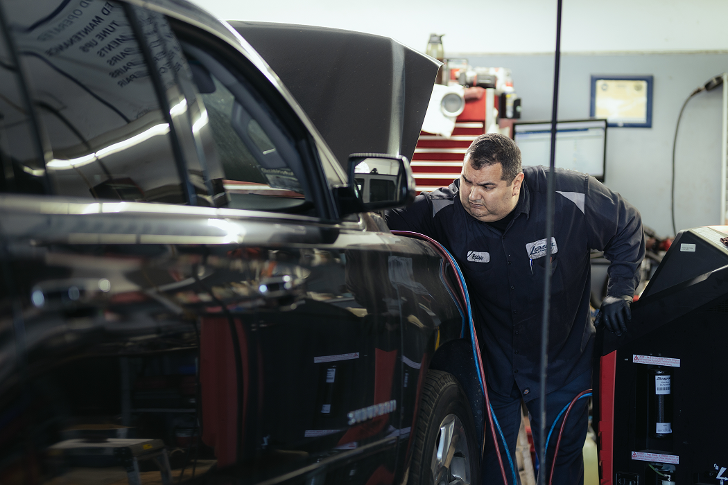 Technician working on a car | Larsen Automotive