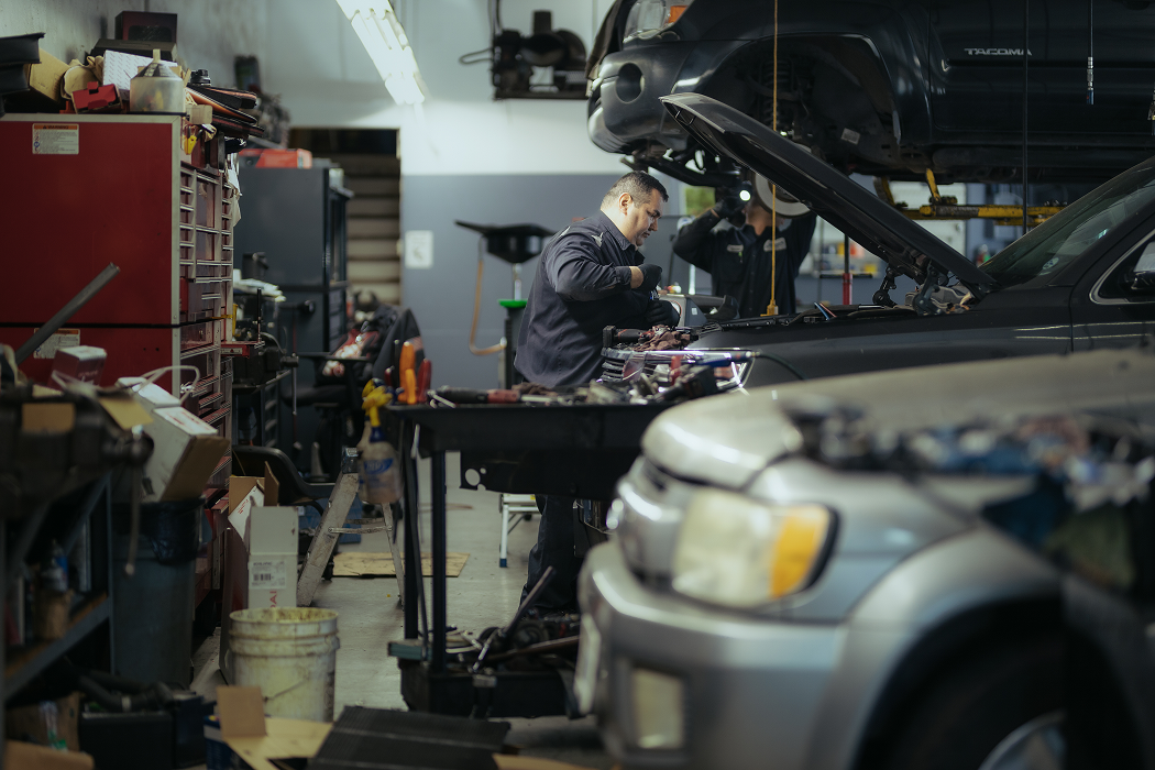 Technician working on a car | Larsen Automotive