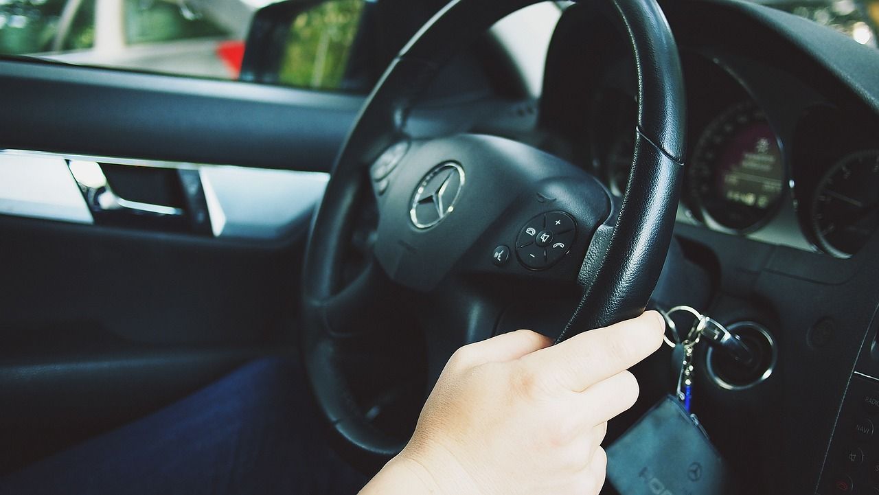 Front seat of vehicle steering wheel | Larsen Automotive Inc