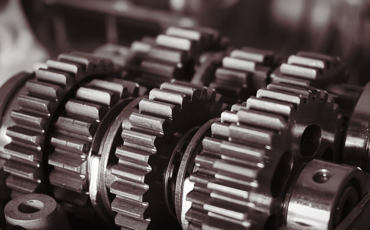 Gears inside engine | Larsen Automotive Inc