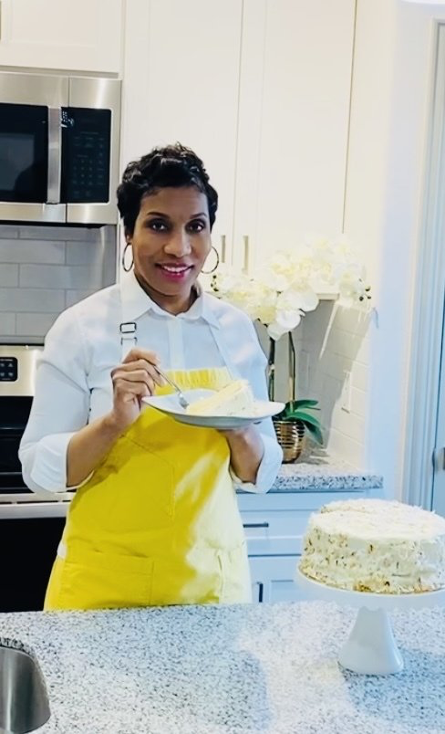 Blogger enjoying coconut cream cake