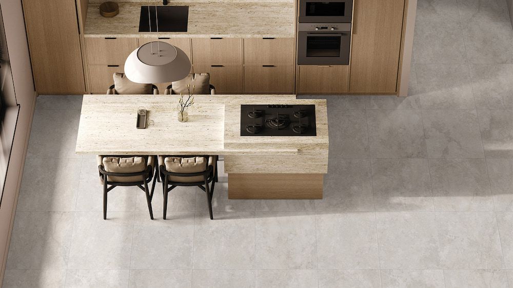 An Aerial View of a Kitchen With a Table and Chairs — Tileflair in Mitchell, ACT