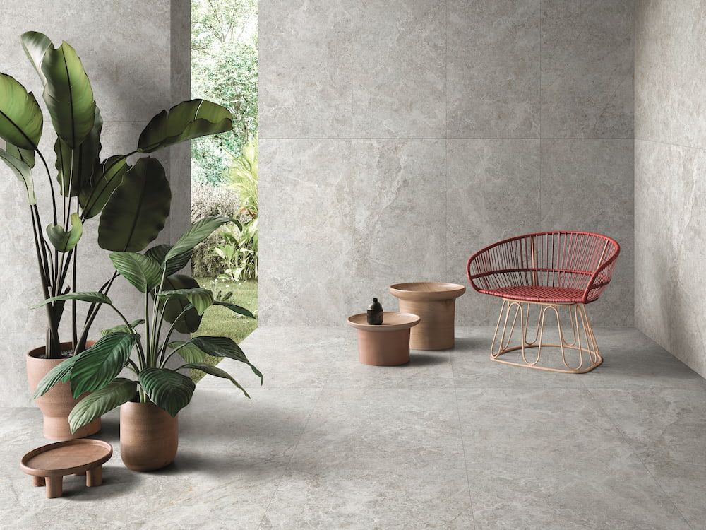 A Room With a Lot of Potted Plants and Tables and Chairs — Tileflair in Mitchell, ACT