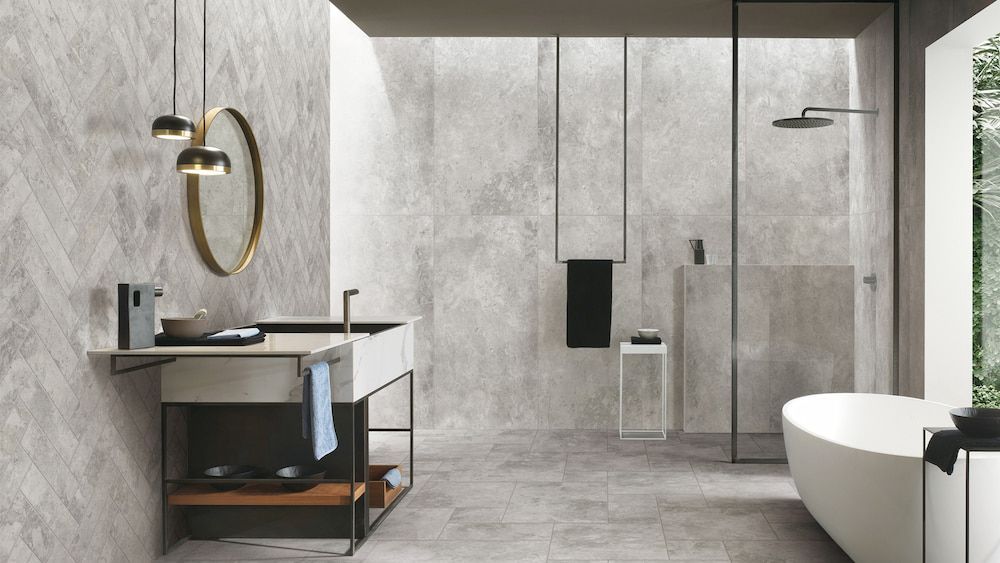 A Bathroom With a Tub, Sink, Mirror and Shower — Tileflair in Mitchell, ACT