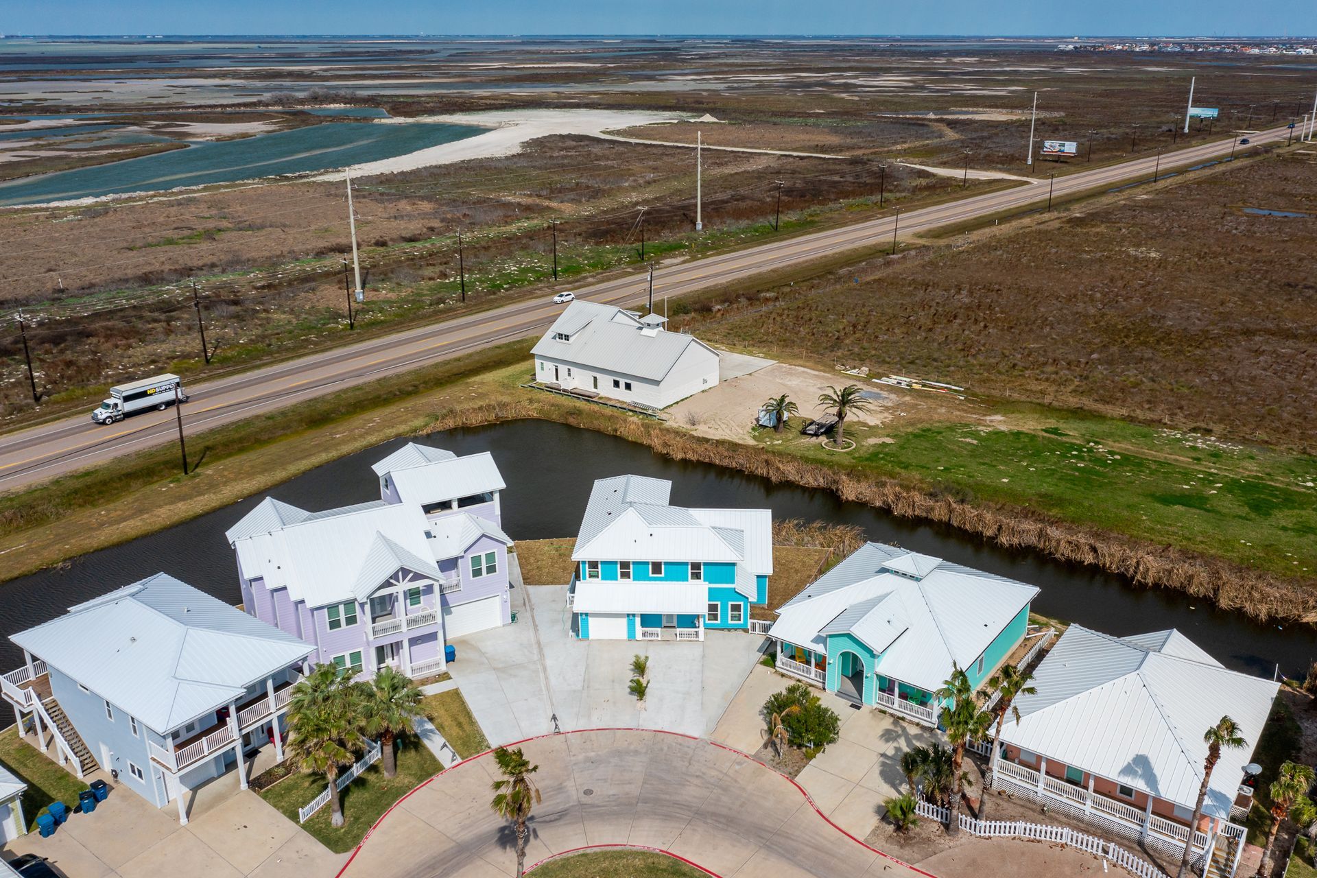 An aerial view of a residential area with a lot of houses