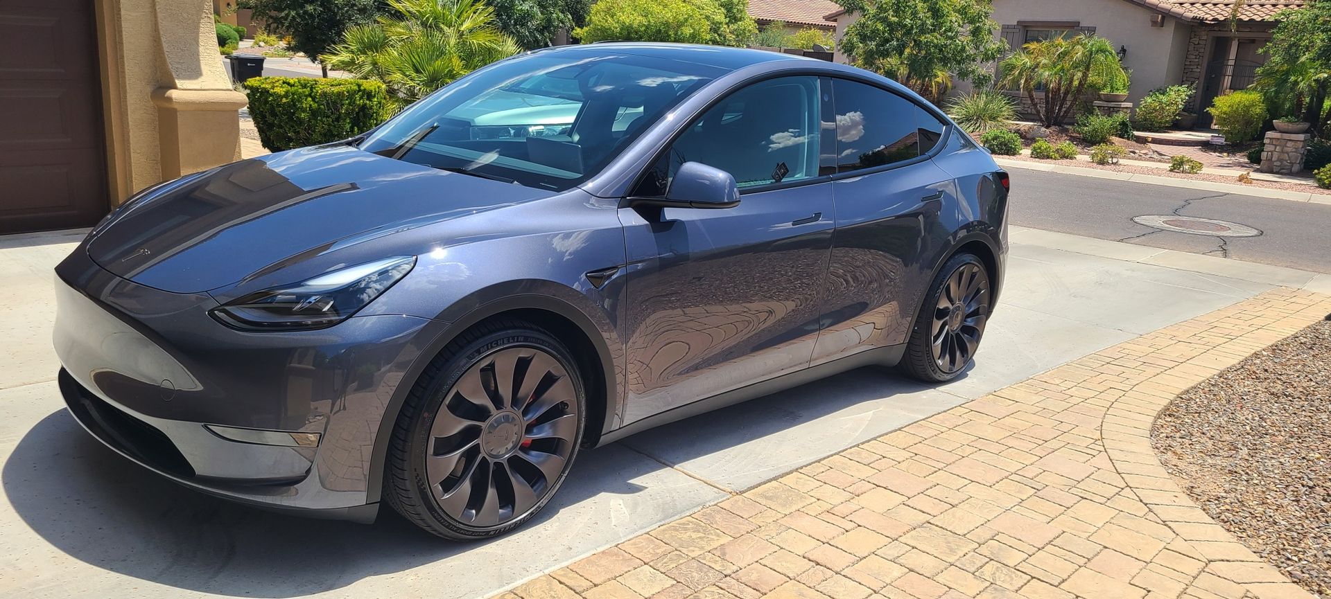 Gray Tesla Model Y after ceramic coating service in Gilbert AZ