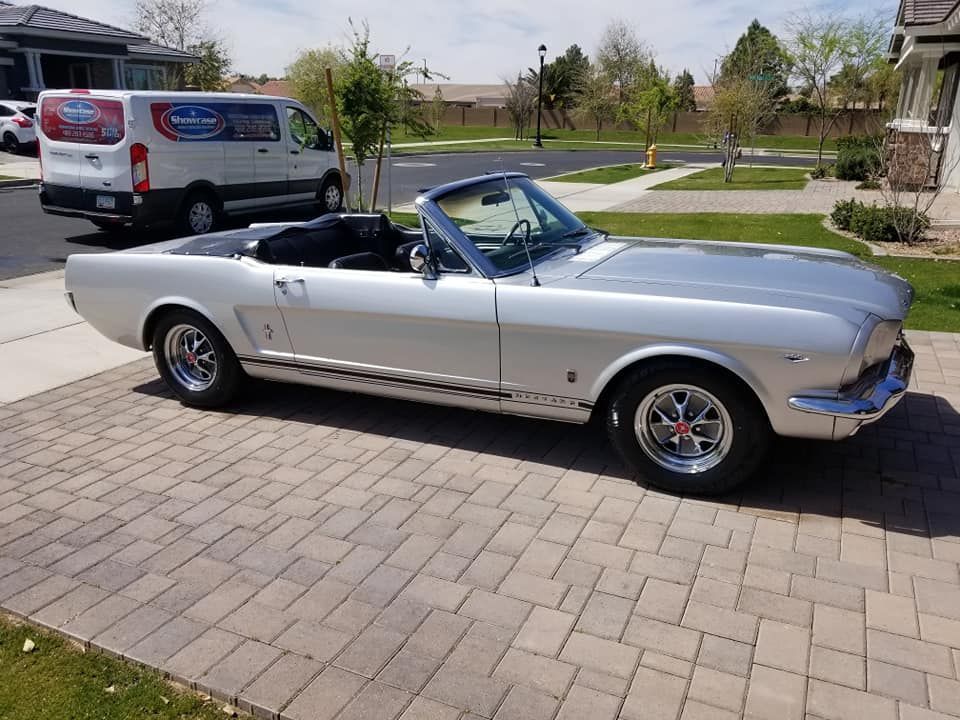 White Ford Mustang convertible after professional detailing at a customer home