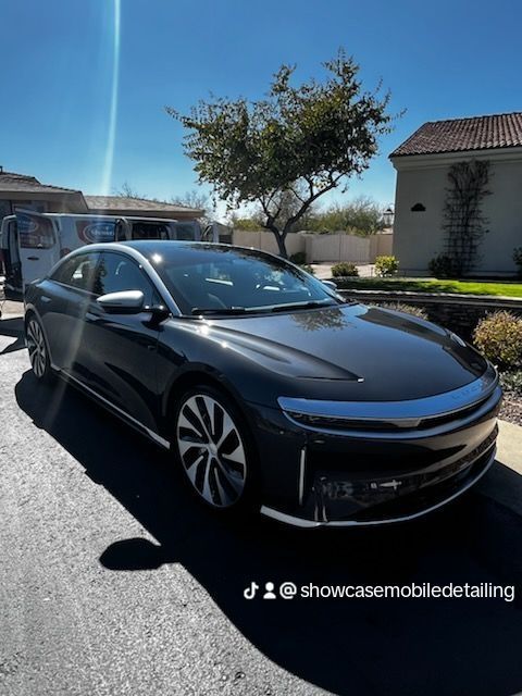 Luxury sedan with polished paint after ceramic coating service in Gilbert AZ