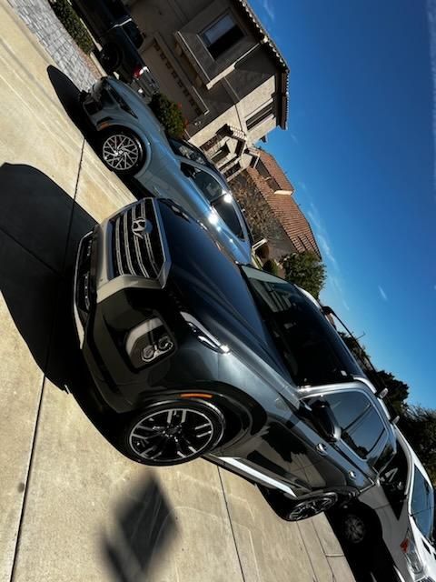 Black Mercedes-Benz SUV with polished paint after ceramic coating service
