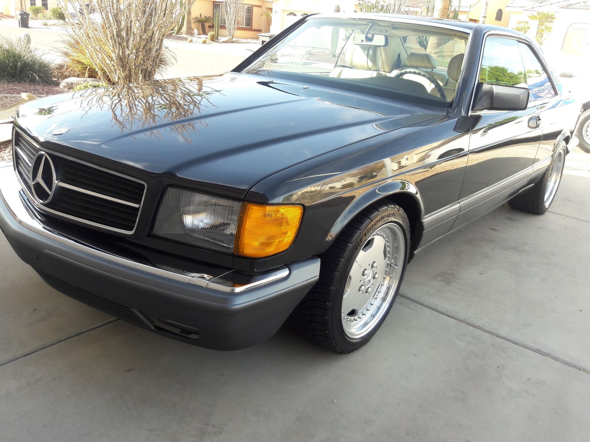Black Mercedes-Benz coupe with polished exterior after ceramic coating service