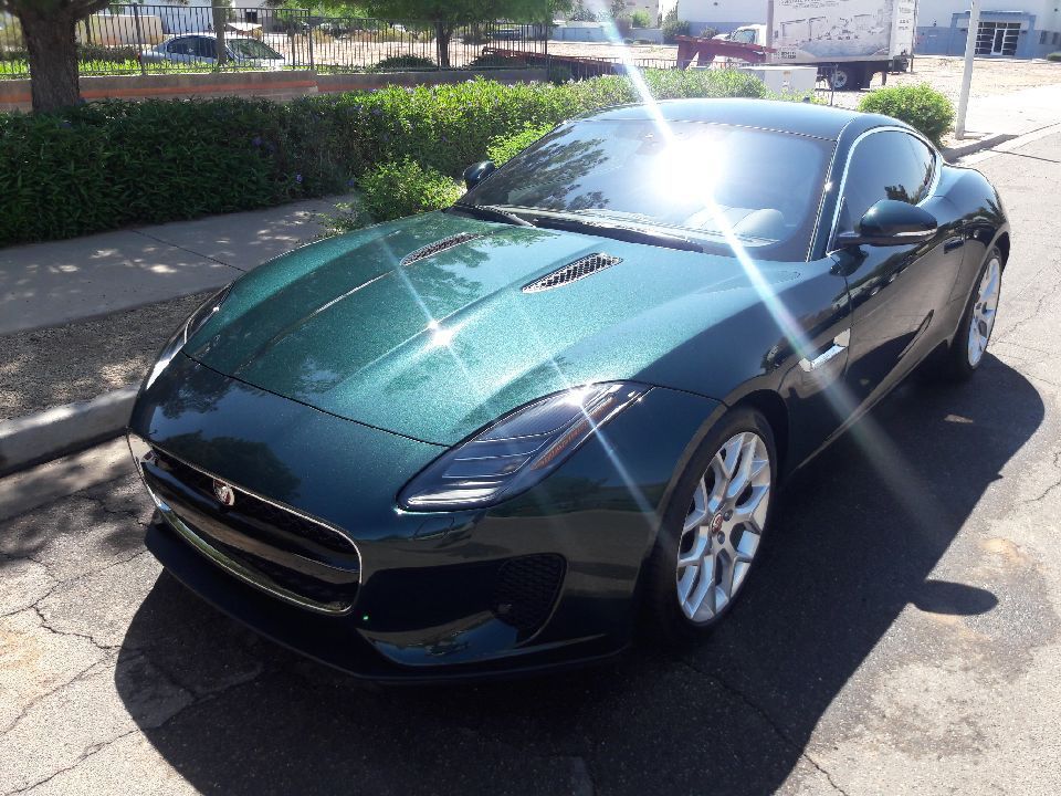 Green Jaguar F-Type with glossy finish after ceramic coating service in Gilbert AZ