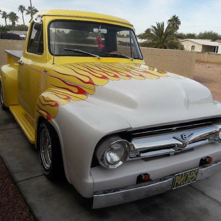 Restored classic Ford pickup truck with custom paint after exterior detailing