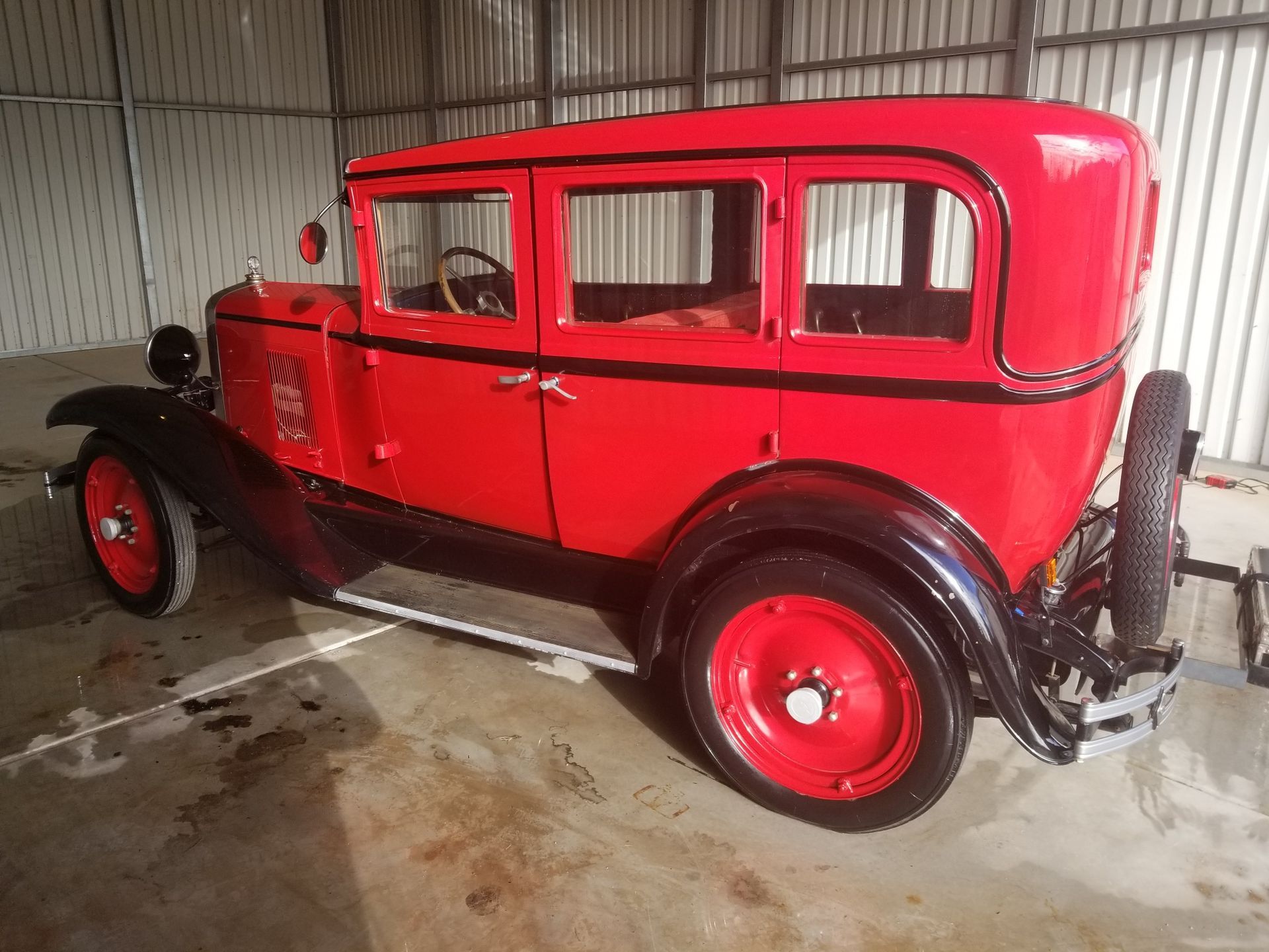 Classic car with glossy paint after ceramic coating service