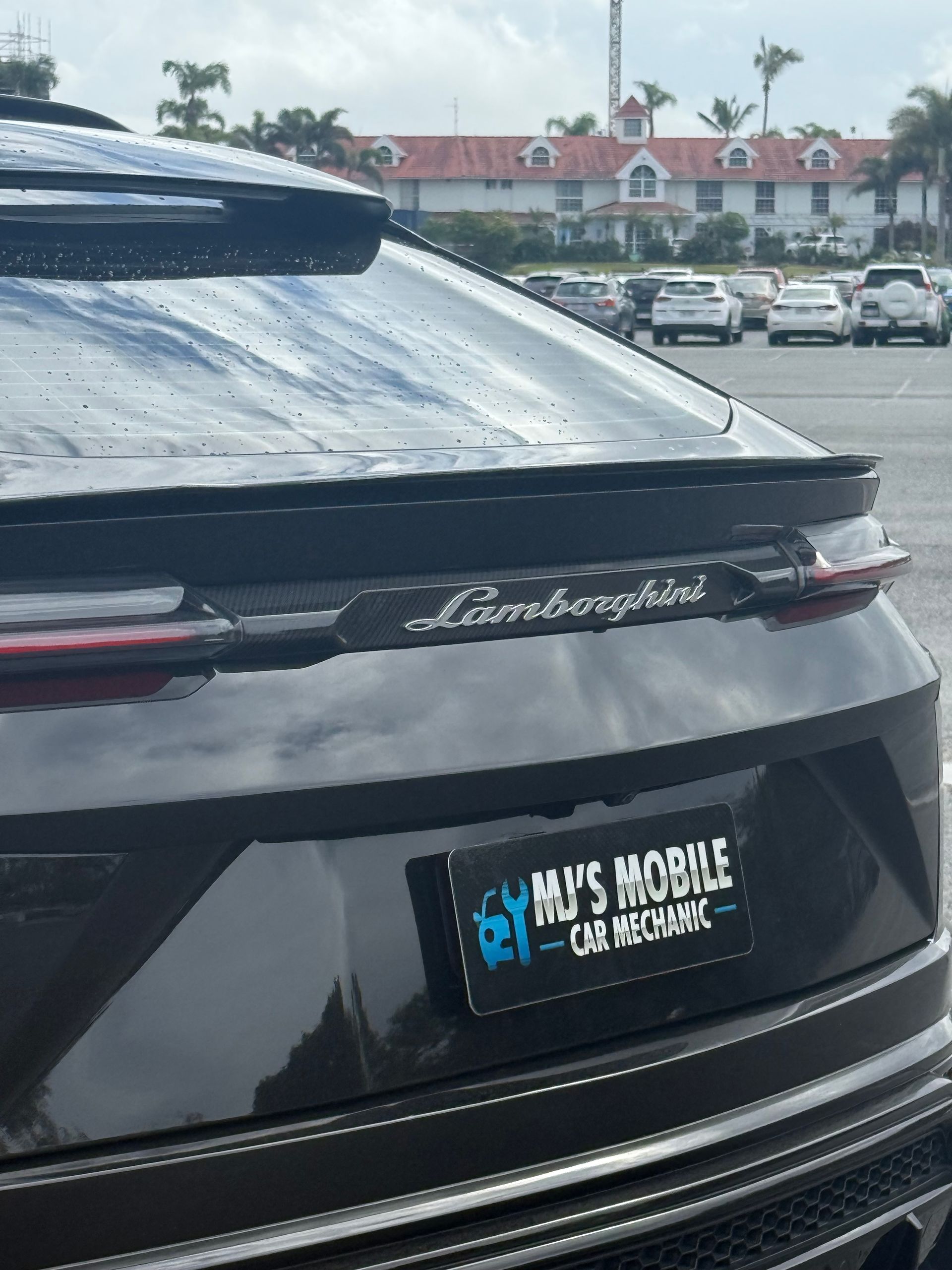 Black Lamborghini Rear with Hps Mobile Plate — MJ's Mobile Car Mechanic In Kiama, NSW