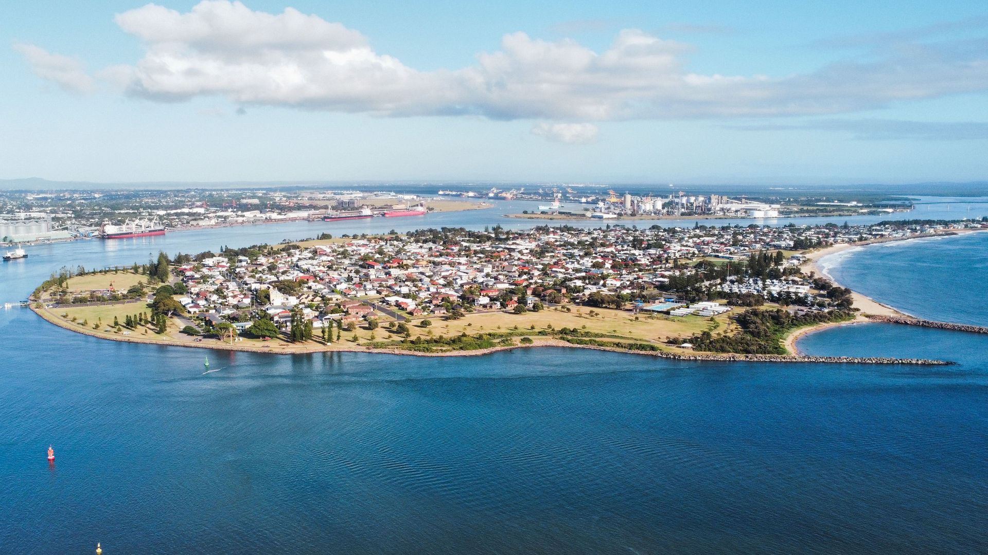 Aerial View of A Coastal Island Town with Houses — MJ's Mobile Car Mechanic In Dapto, NSW