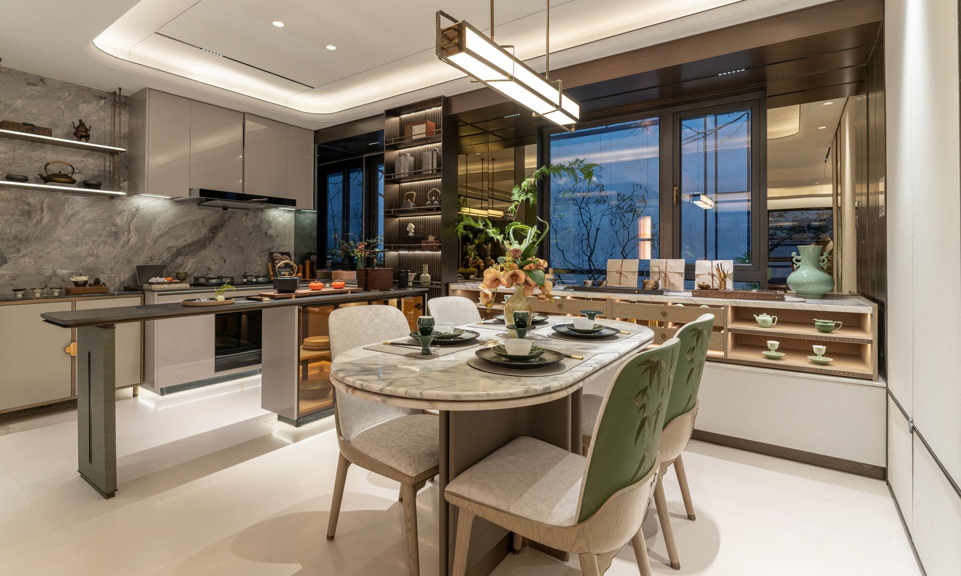A dining room with a table and chairs in a kitchen.