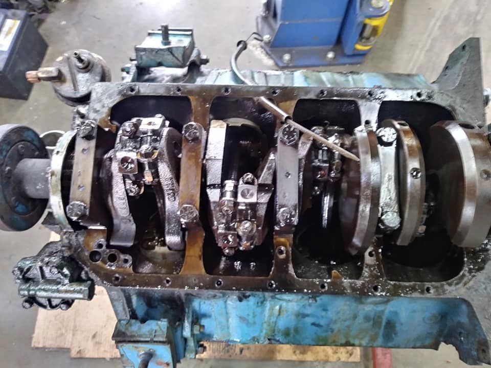 A close up of a crankshaft of a machine