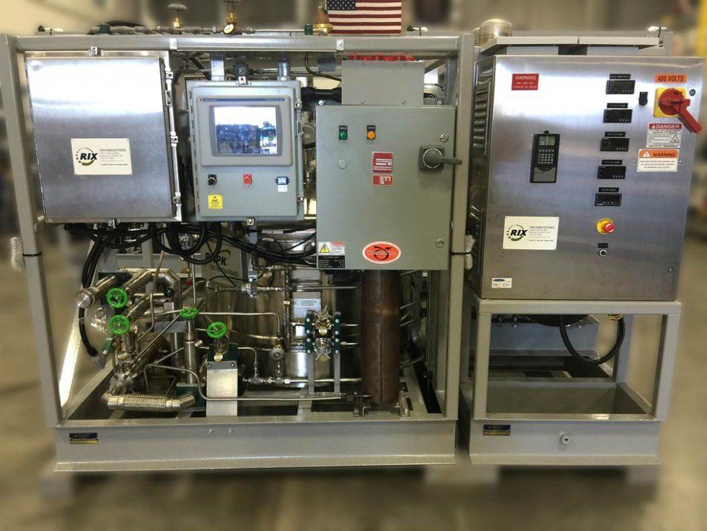 A stainless steel machine with an american flag on top of it