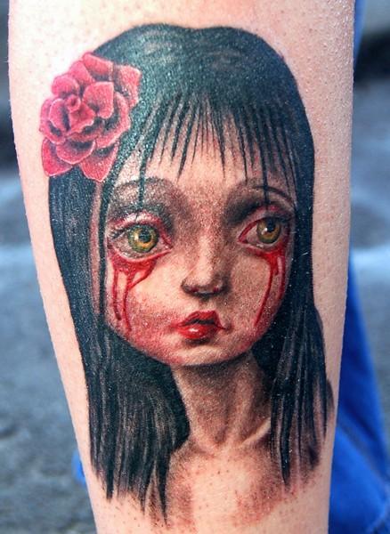 Girl with rose on hair crying blood tattoo — Little Rock, AR — Seventh Street Tattoos & Piercing