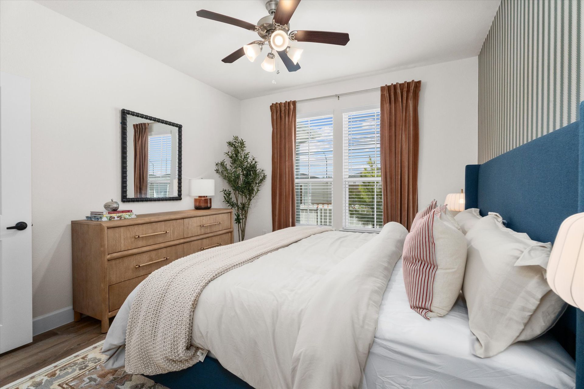 Spacious bedroom in a cottage-style apartment at The Cottage Green Baytown in Baytown TX