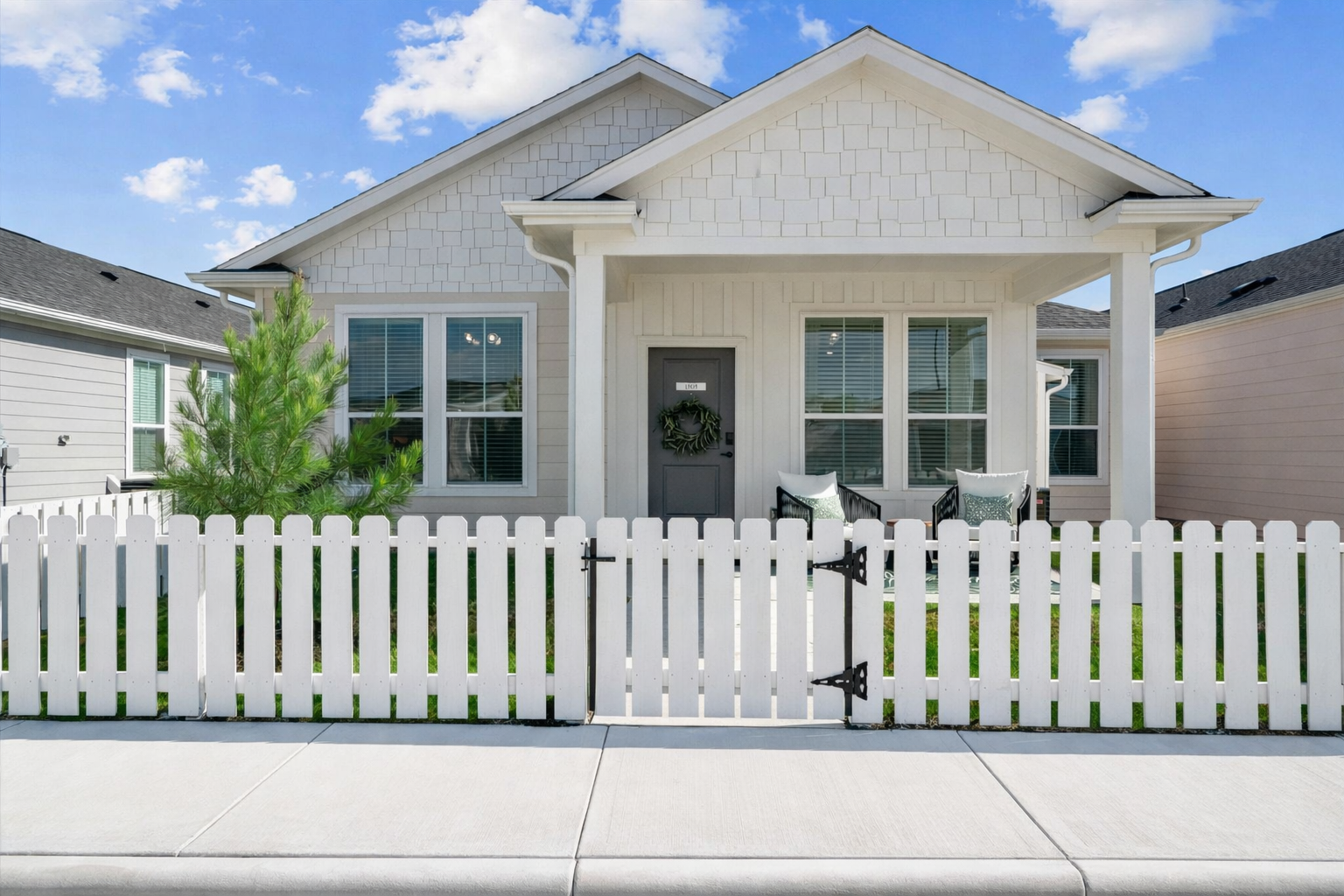 Bungalow-style apartment home with private entrance at The Cottage Green Baytown in Baytown TX