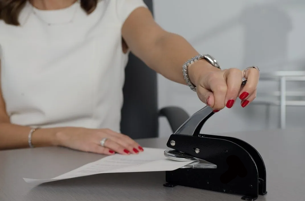 Notary Public Stamping a Loan Document in Douglasville Ga