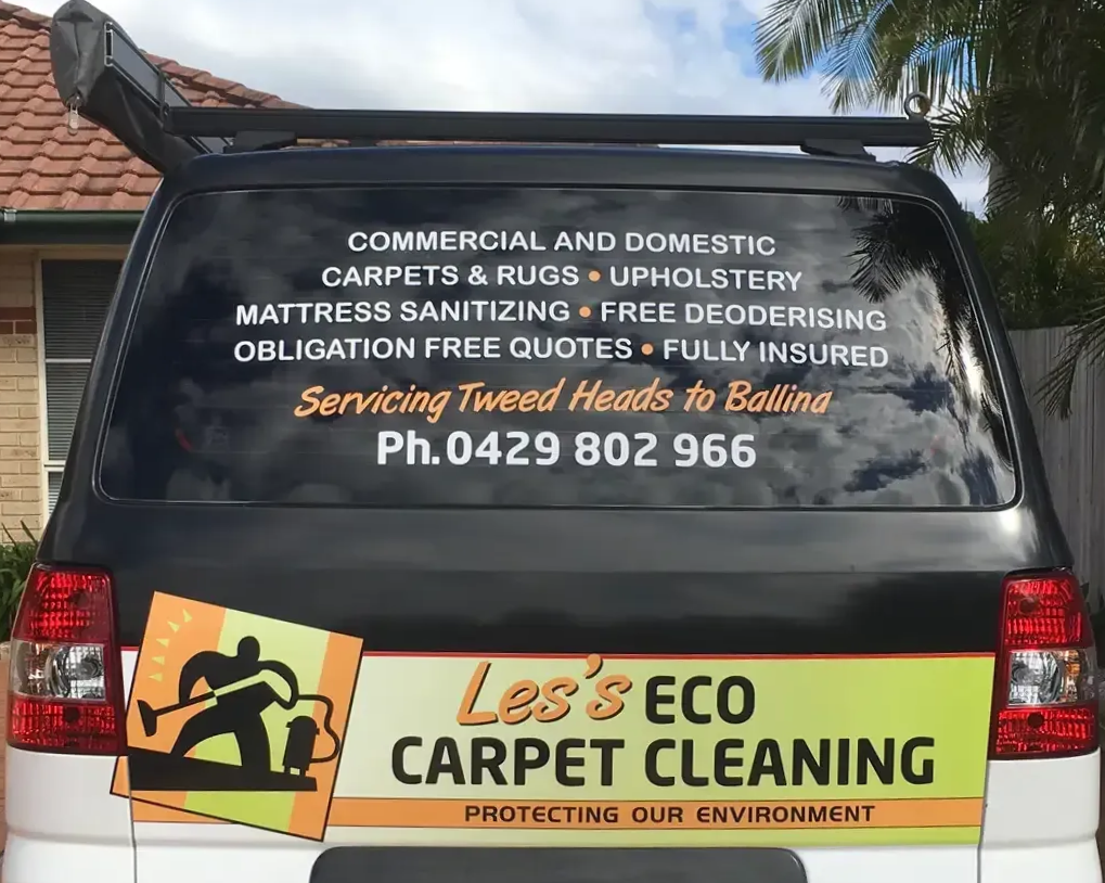 White Car With Business Signage On It — Les's Eco Carpet Cleaning in Byron Bay, NSW