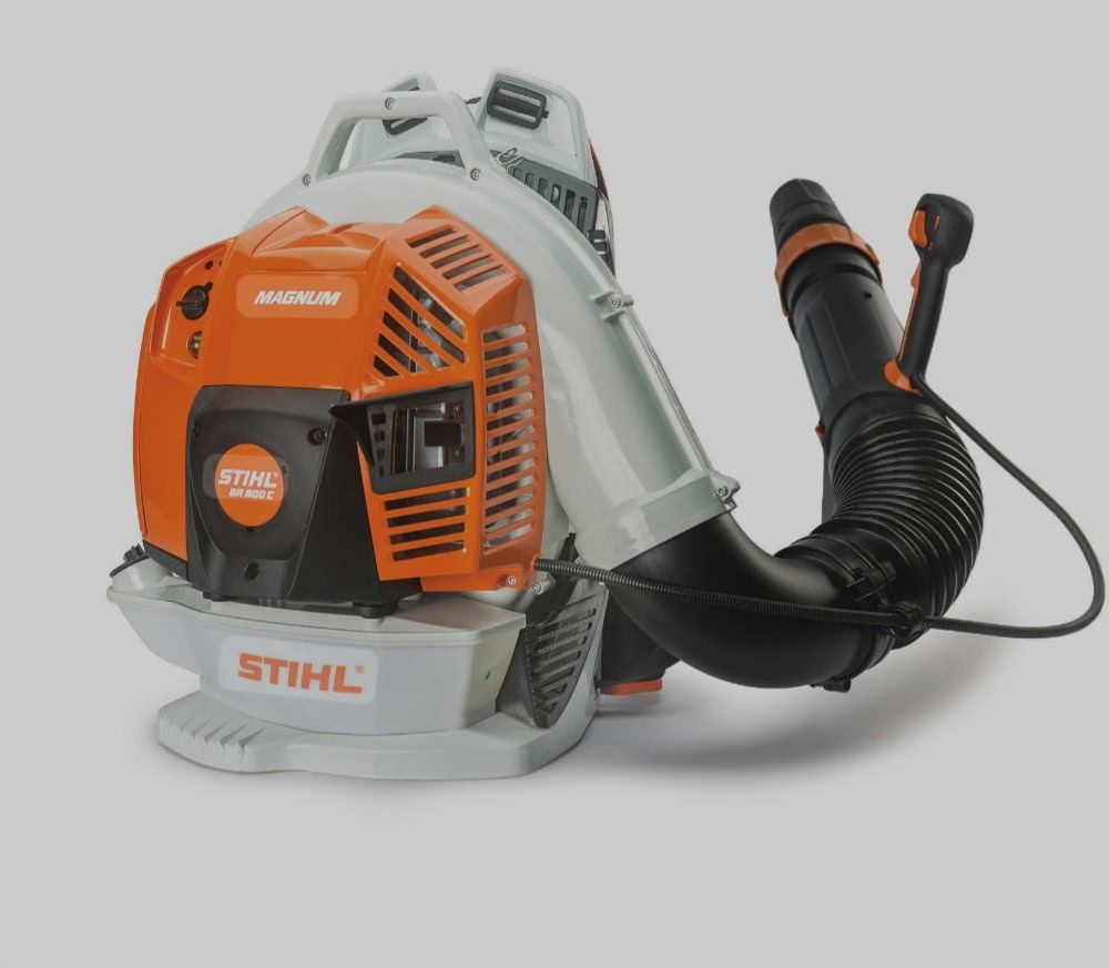 A stihl blower with a hose attached to it