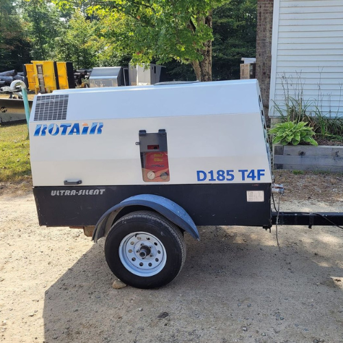 A rotary d185 t4f air compressor on a trailer