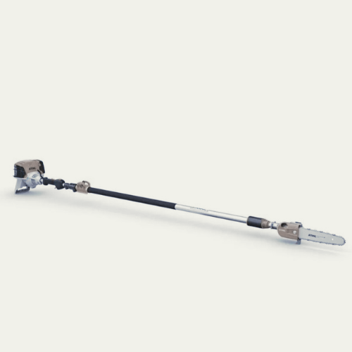 A pole saw is sitting on a white surface.